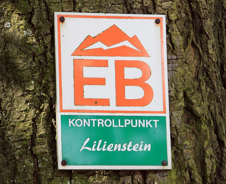 Lilienstein: sign of the international hiking trail from Eisenach to Budapest.