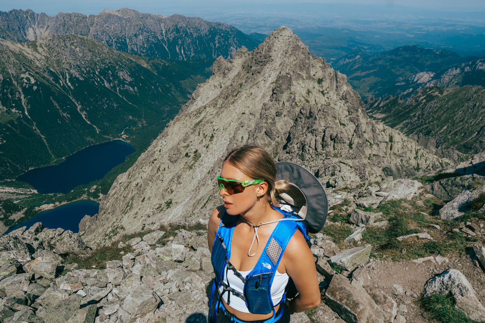 Woman hiking in the Tatra Mountains near Zakopane, Poland, with stunning alpine scenery.