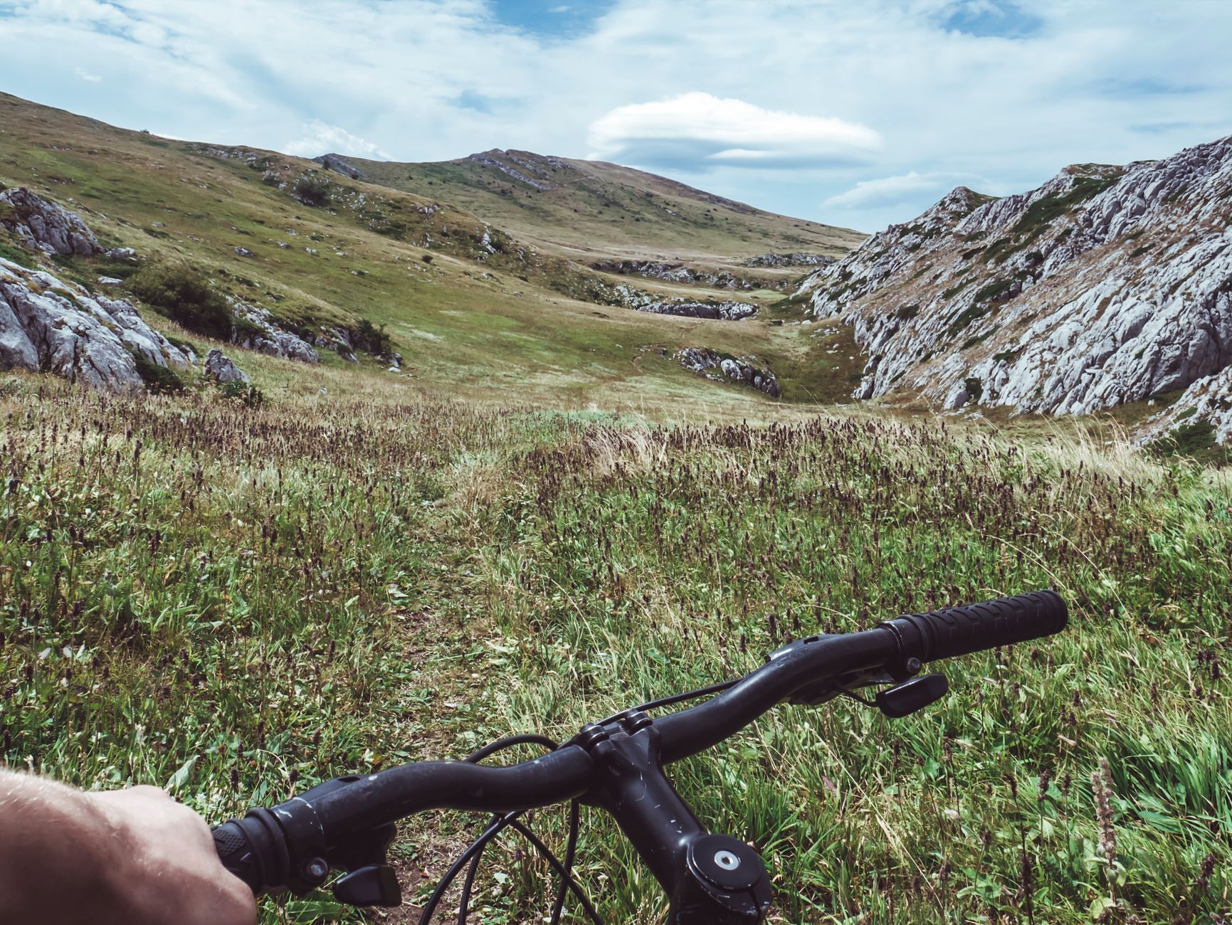 Explore the stunning scenic valley on a thrilling mountain bike trail adventure.