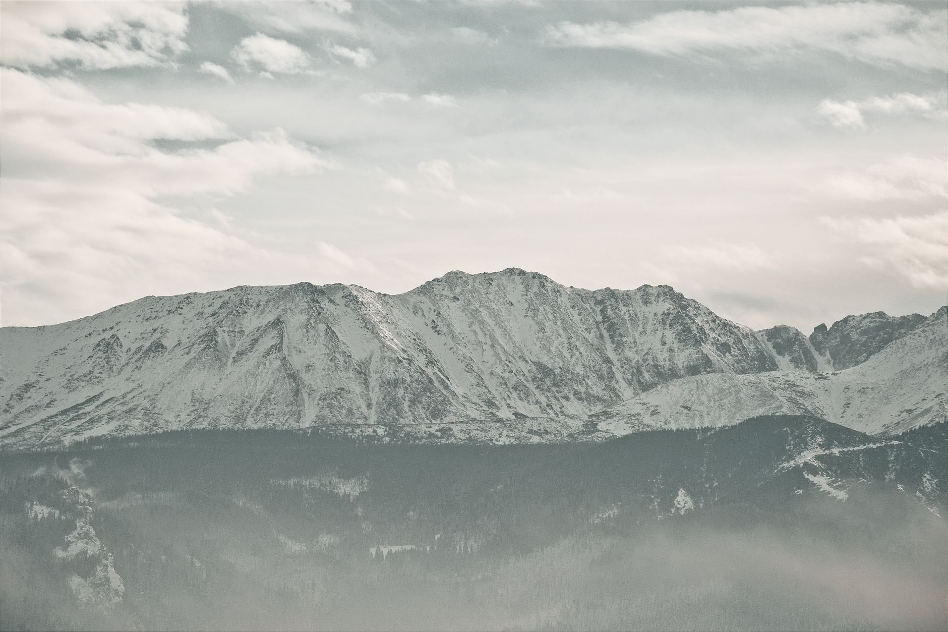 Breathtaking view of the Tatra Mountains covered in snow, captured in Zakopane, Poland.