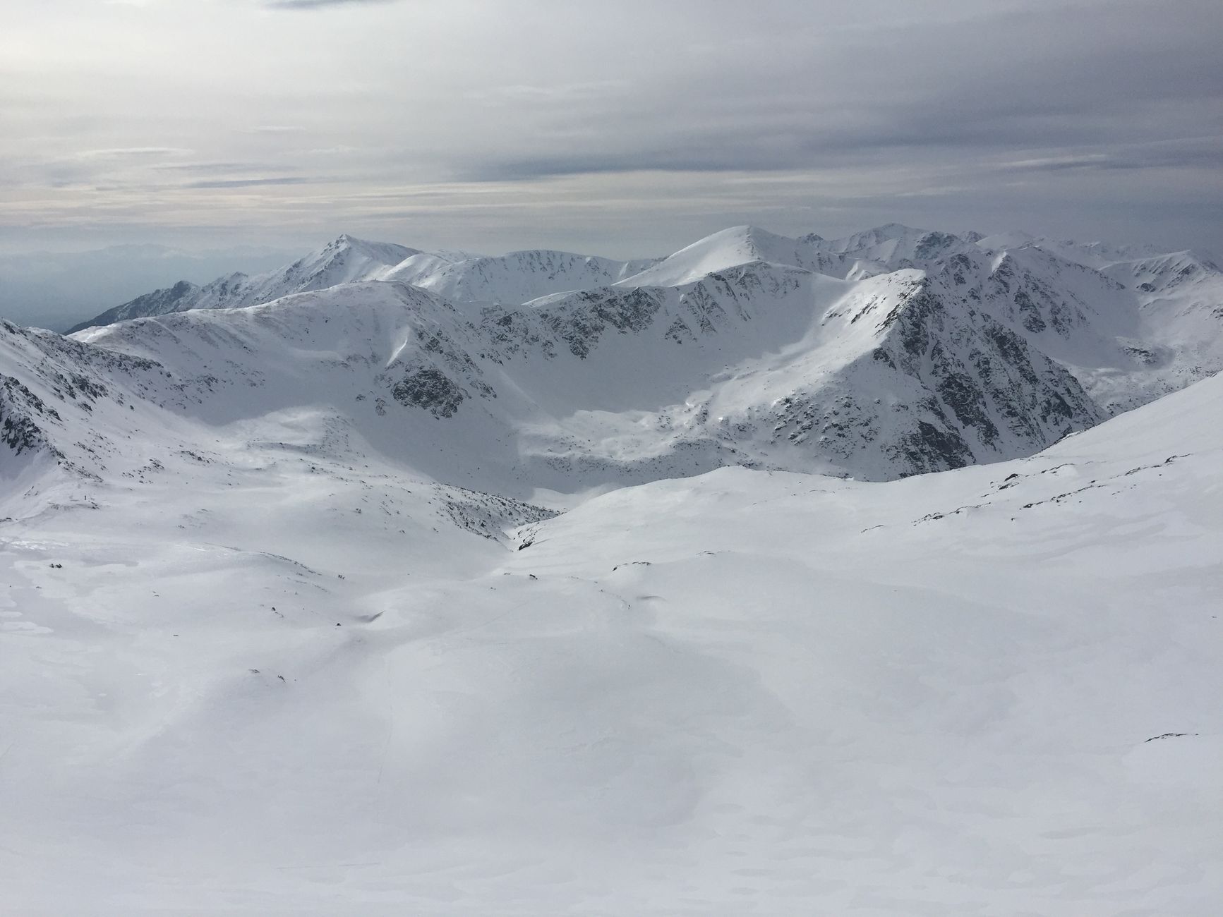 Captivating view of snowy peaks in the Tatra Mountains, Lesser Poland, during winter.