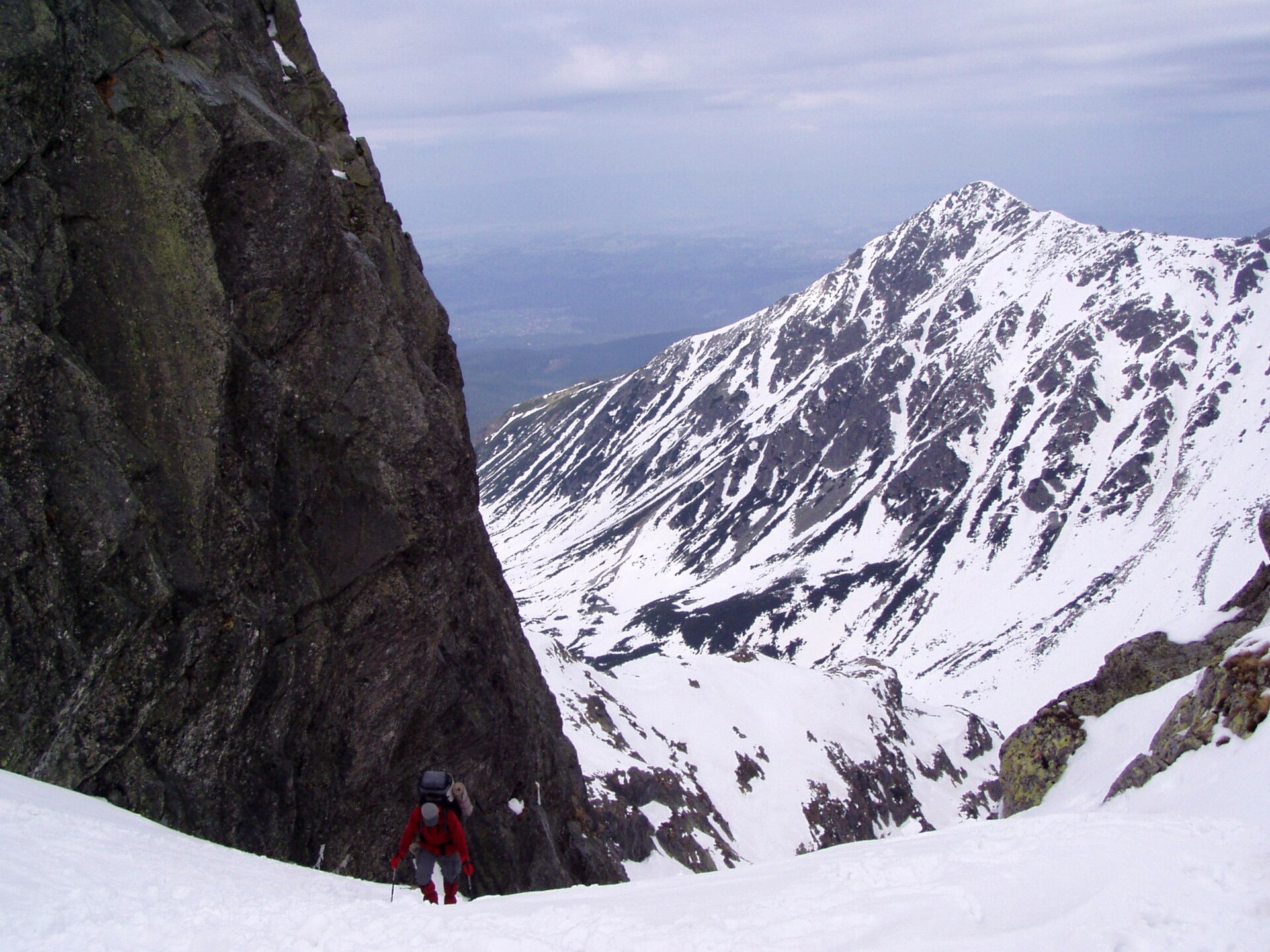 View from Zawrat Pass in Tatra Mountains, Poland. Hiking trail towards Hala Gąsienicowa.