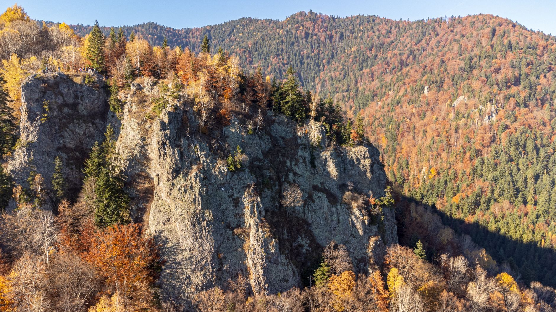 Stunning autumn view over the rocky mountains of Băile Tușnad, Romania.